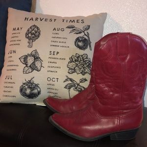 Gently worn red cowboy boots